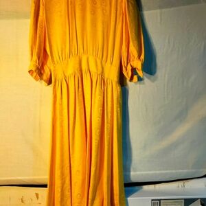 Bold yellow silk dress